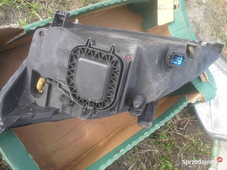 FORD FOKUS MK1 lampa przód ORYG 9801 Oświetlenie Dębno