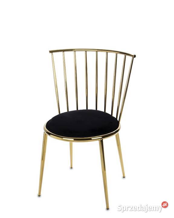 Złote błyszczące nowoczesne krzesło z czarnym siedziskiem