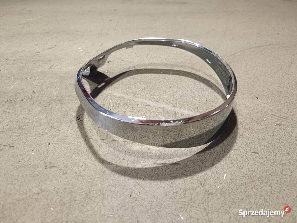 SYM 125 chrom ramka osłona lampy klosz światła