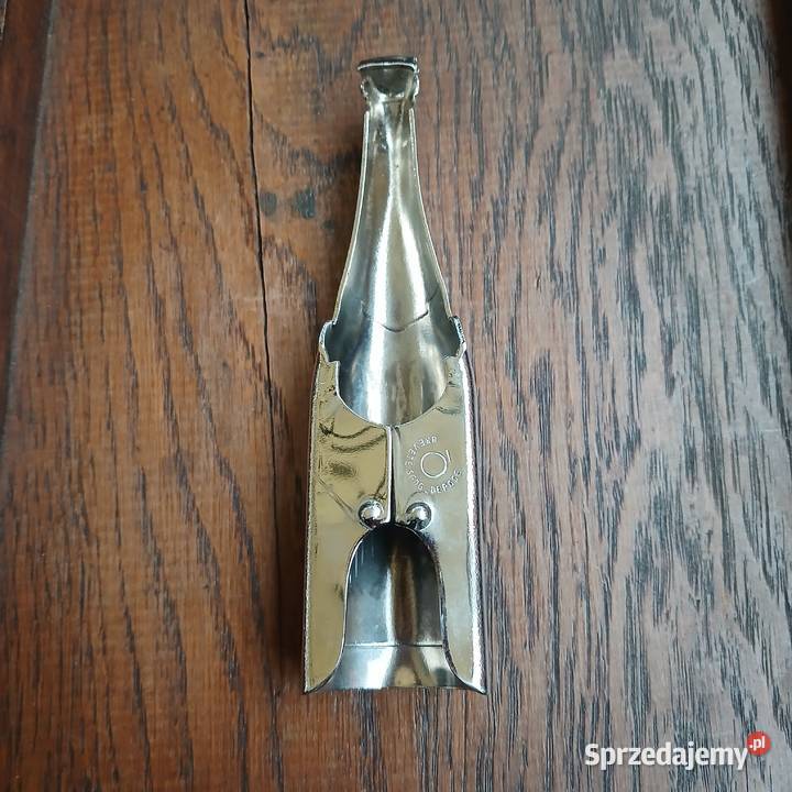 Oryginalny metalowy otwieracz do szampana Warszawa
