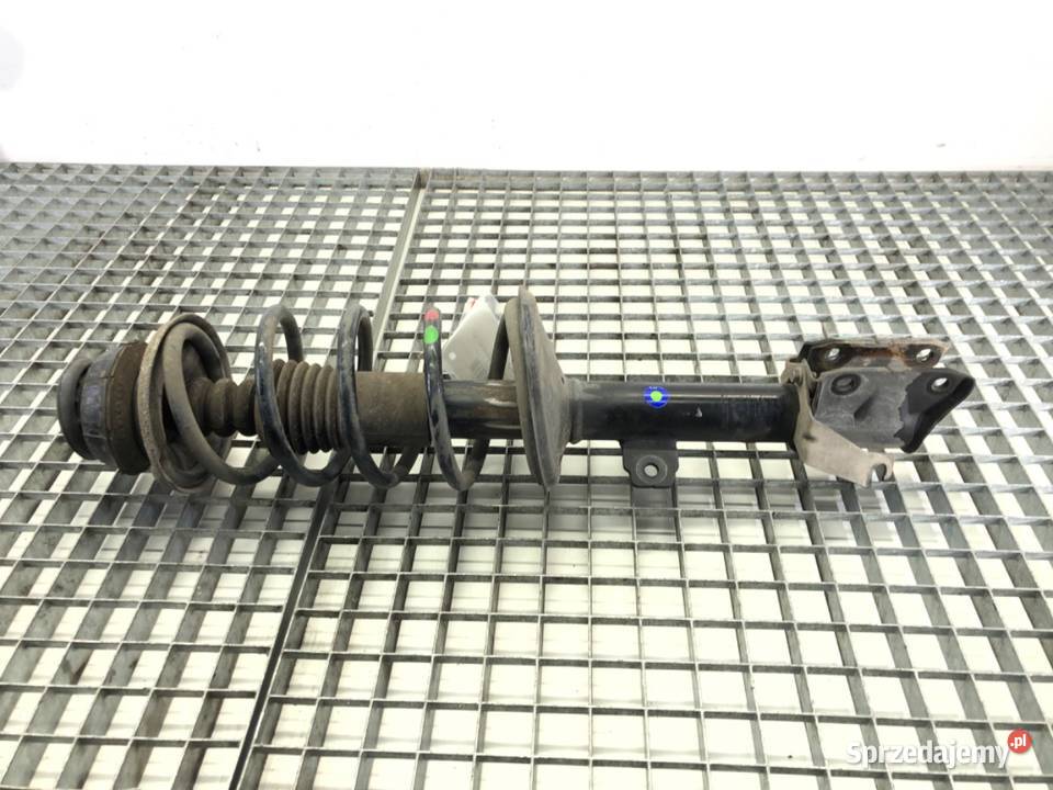 AMORTYZATOR LEWY PRZÓD ZE SPRĘŻYNĄ DACIA DUSTER