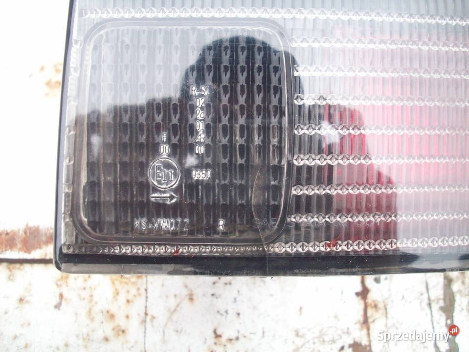 VW PASSAT B5 KOMBI lampy tył ciemne ori Iława