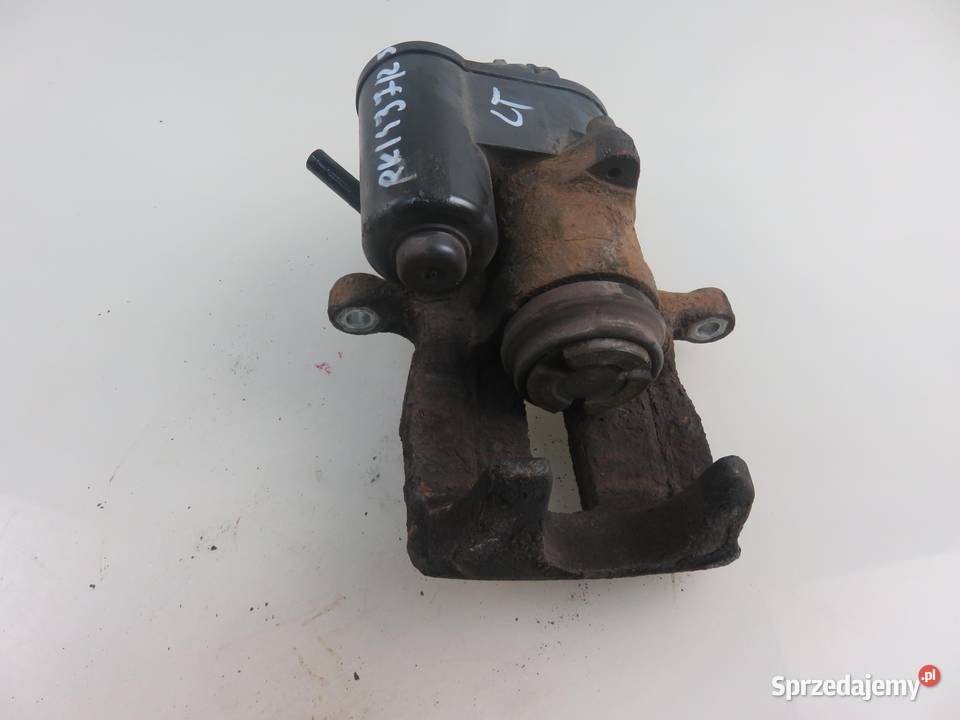 ZACISK LEWY TYŁ VW PASSAT B7 20 TDI sprzedam