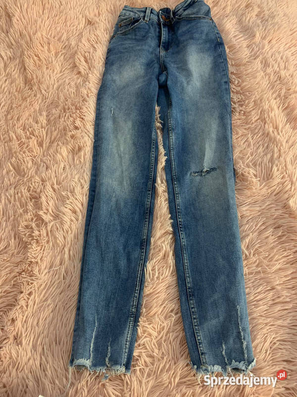 Jeansy damskie z rozdarciami House Jasło