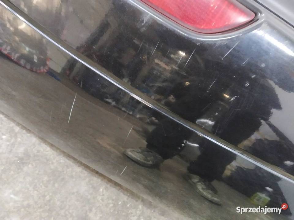 ZDERZAK TYŁ CZARNY Nissan Note I 2004