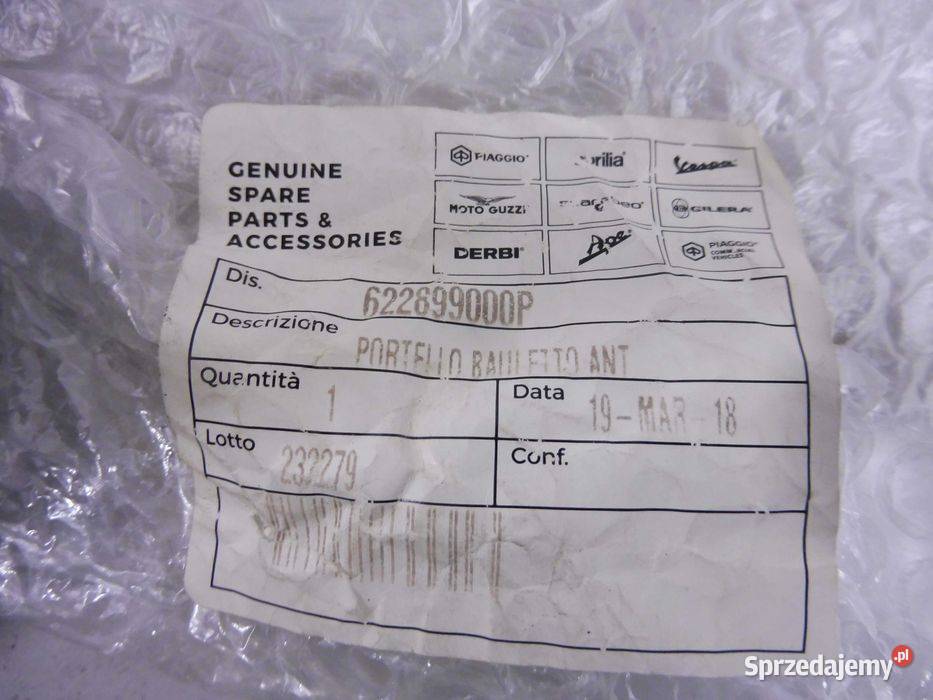 Piaggio Vespa LX 50 0513r drzwi schowka klapka Poznań