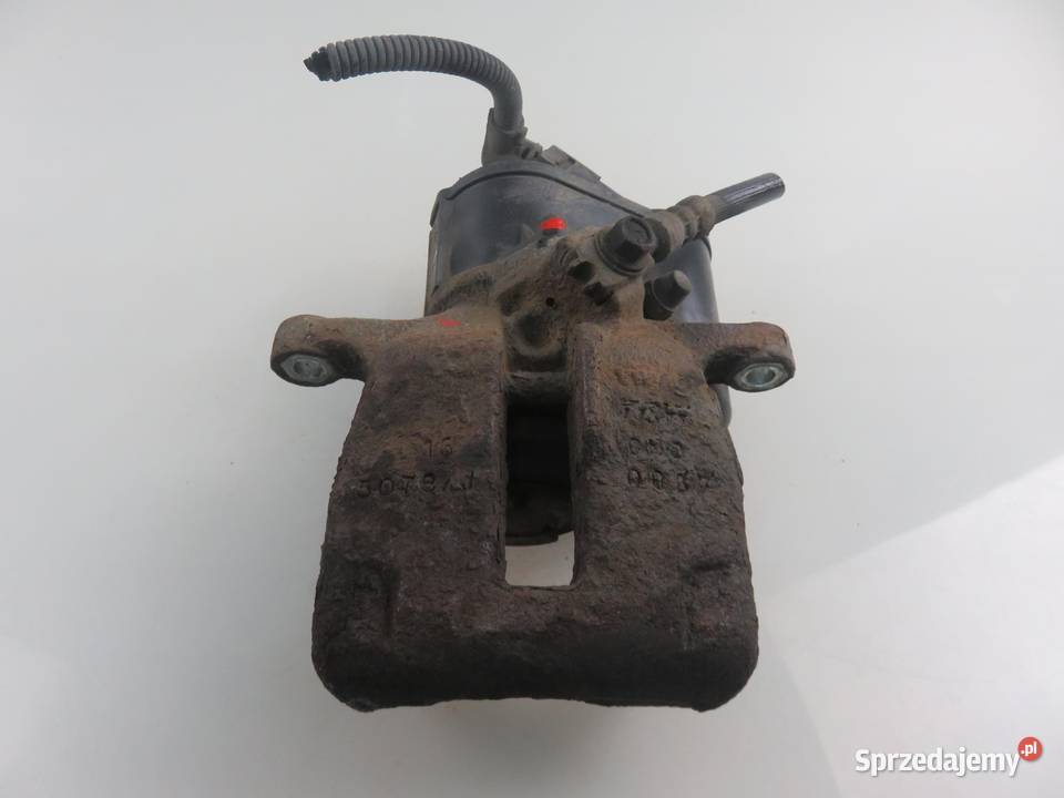 ZACISK LEWY TYŁ VW PASSAT B7 20 TDI