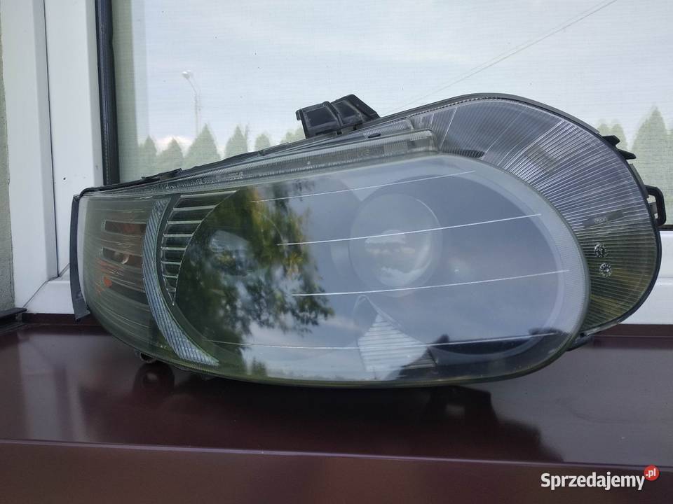 Saab 95 95 FL lampy przednie reflektory xenon sprzedam