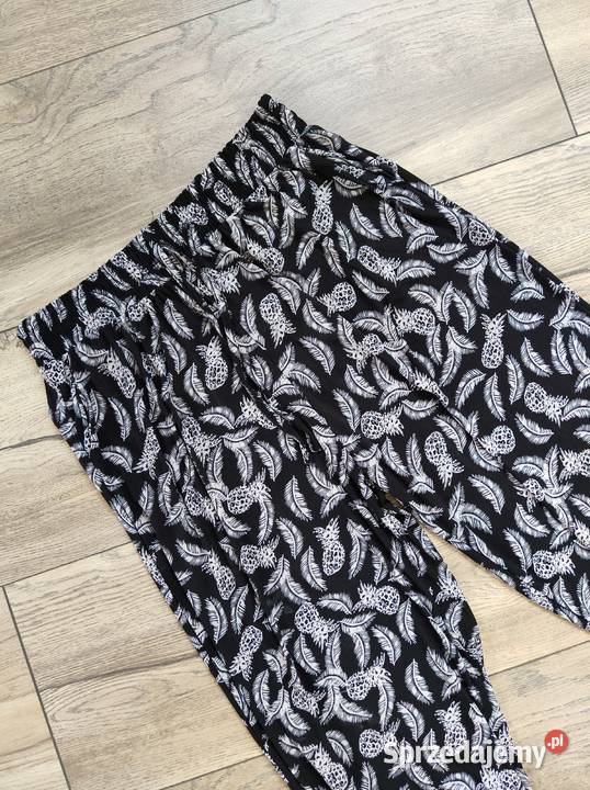 Materiałowe spodnie w pióra 40 42 44 46