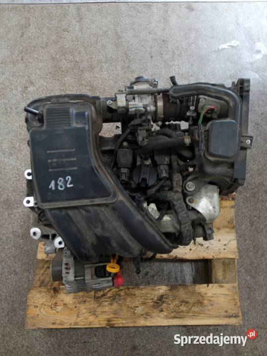 SILNIK KOMPLETNY BENZYNA HR12 892372B 12 Nissan