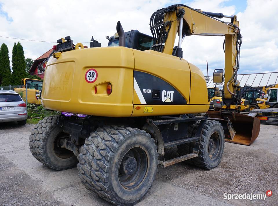 Koparka kołowa CAT M 313 D 2015 Jeziorko
