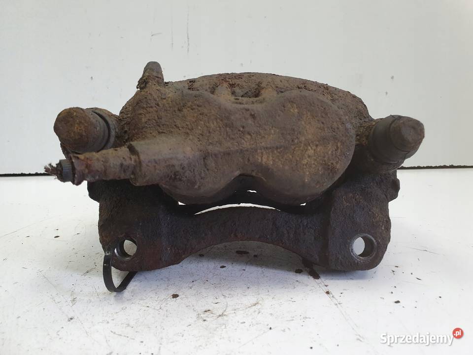 Renault Master II PRZEDNI ZACISK HAMULCOWY lewy osobowe Rudka