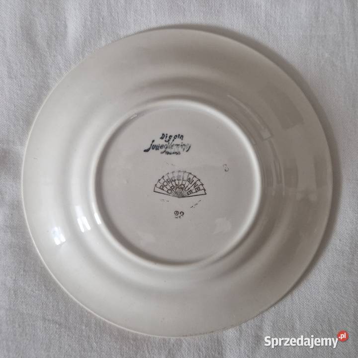 Ozdobny talerz porcelanowy z wizerunkiem Warszawa