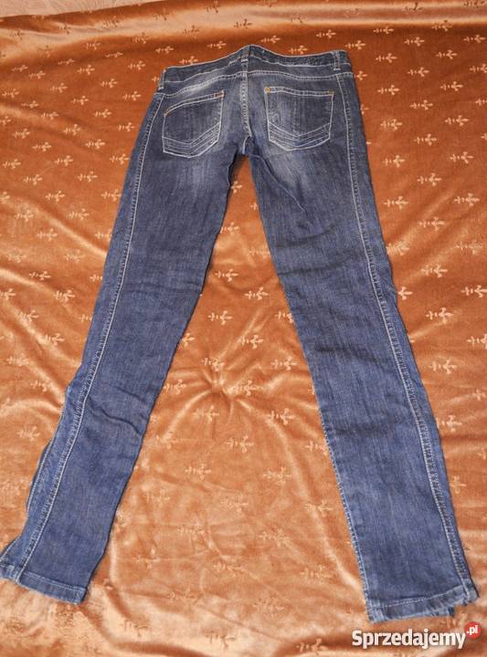 Markowe spodnie jeans PullBear niebieski Odzież damska