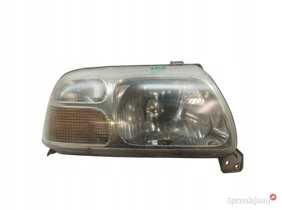 LAMPA PRZÓD PRAWA EU 10032080 Suzuki Grand Lampy przednie