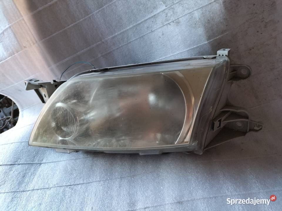 LAMPA LEWA PRZÓD MAZDA PREMACY 1 Kamień-Kolonia