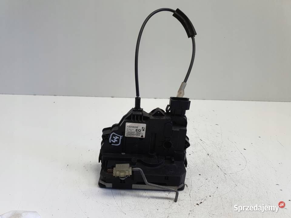 Opel Corsa D ZAMEK DRZWI lewy tył kierowcy Rudka