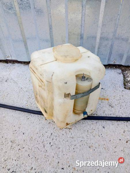 Zbiorniczek spryskiwacza z pompką MTZ Sędziszów