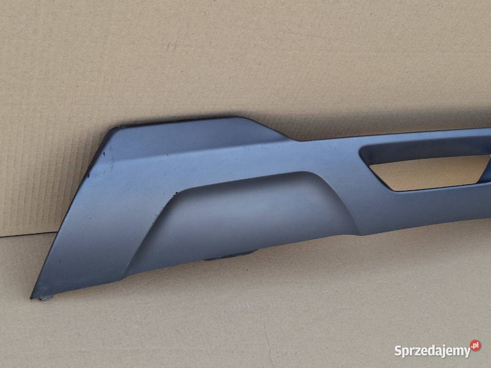 DACIA SPRING DOKŁADKA ZDERZAKA TYŁ DYFUZOR Bieleń