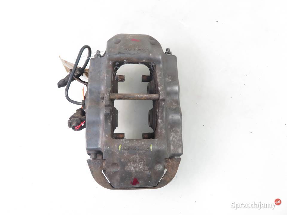 ZACISK LEWY TYŁ AUDI Q7 42 FSI 208930051A