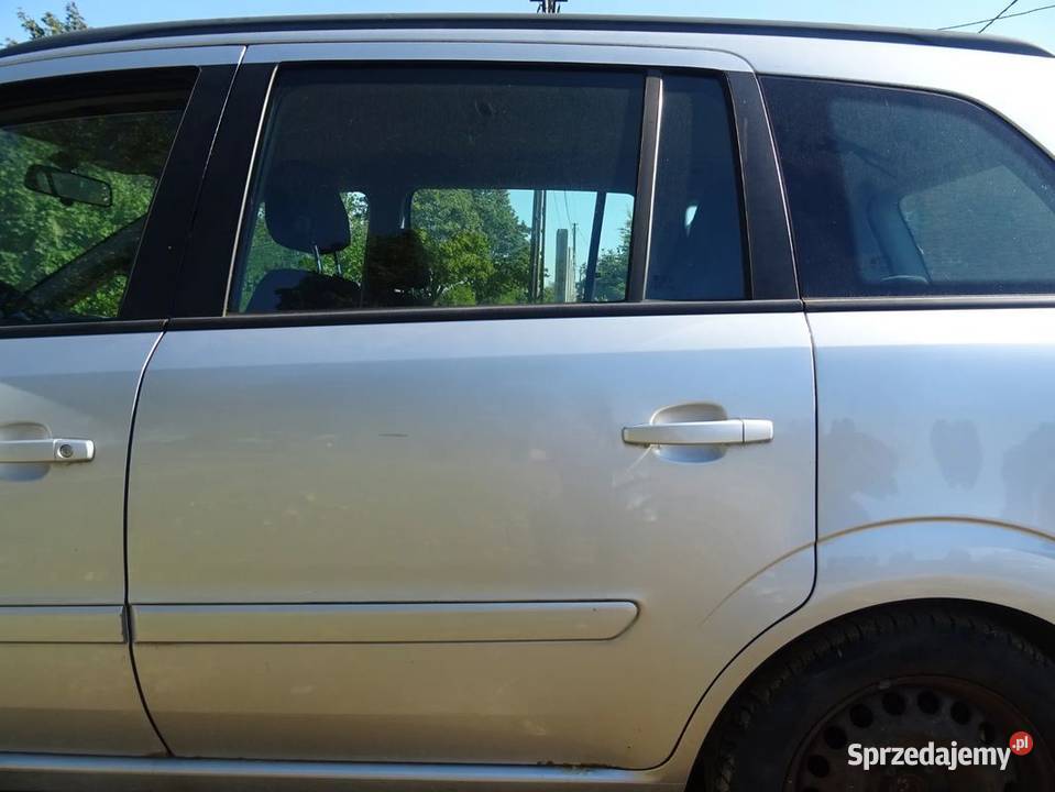 Drzwi szyba mechanizm podnośnik srebrne Zafira B Parcice