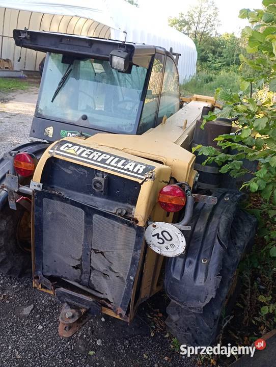 Mini ładowarka teleskopowa mała CAT th210 Rusinów