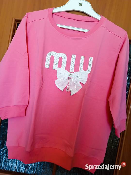 Bluza różowa z ozdobną kokardą i perełkami śląskie