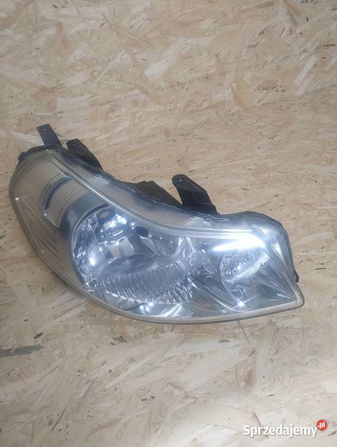 Lampy przód Suzuki SX4 oryginał Jodłownik