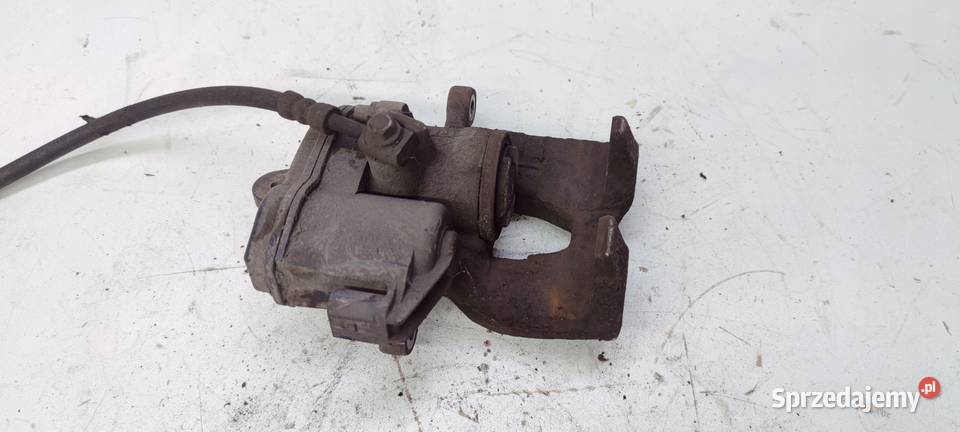 ZACISK HAMULCOWY LEWY AUDI A4 B9 A5 8W0615405AA osobowe Przystajń