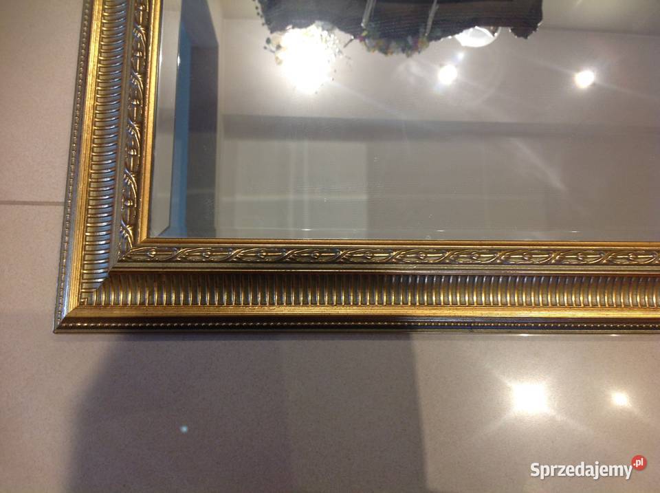 Lustro w złotej ramie sprzedam