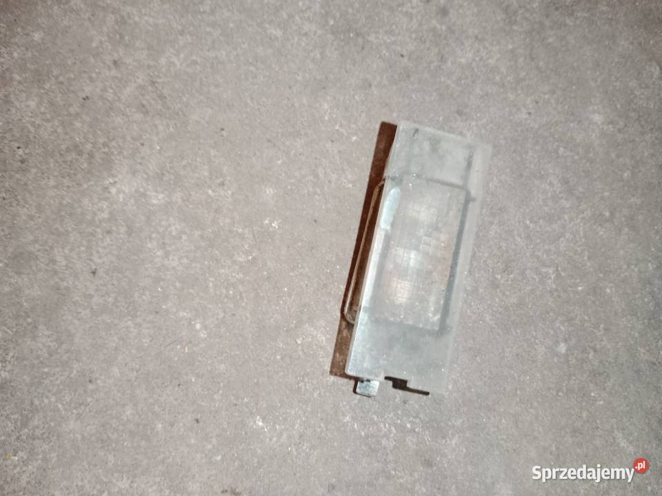 7700796163 lampa tablicy rejestracyjnej Megane Lampki tablicy rejestracyjnej Poddębice