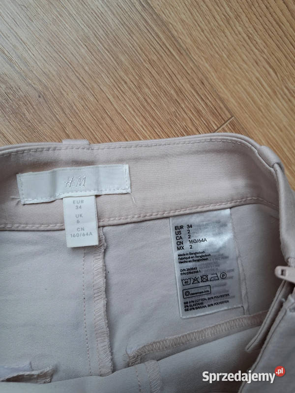 Klasyczne rurki HM w odcieniu pudrowego różu różowy Trąbki Wielkie sprzedam