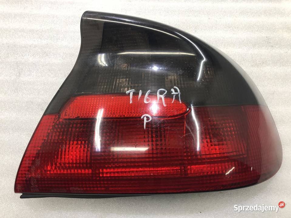 LAMPA PRAWY TYŁ TYLNA OPEL TIGRA 90482001 Lampy tylne sprzedam