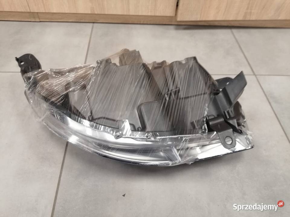 Citroen C4 b7 reflektor lewy przód Kozubszczyzna