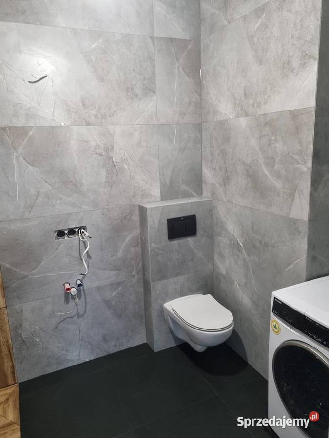 Układanie płytek lamelipaneli wykończenia wnętrz Kraków