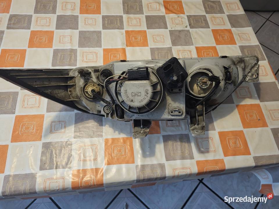 Lampa przednia Musso 1998r
