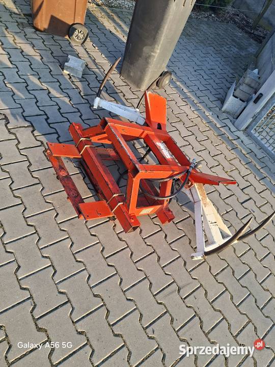 Chwytak do bel mini ładowarki Września