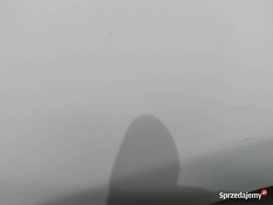 BŁOTNIK LEWY PRZÓD BIAŁY Opel Zafira III 2011