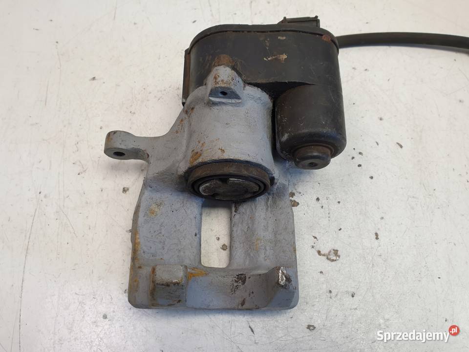 Volvo V70 III S80 II ZACISK HAMULCOWY Lewy tył osobowe Rudka