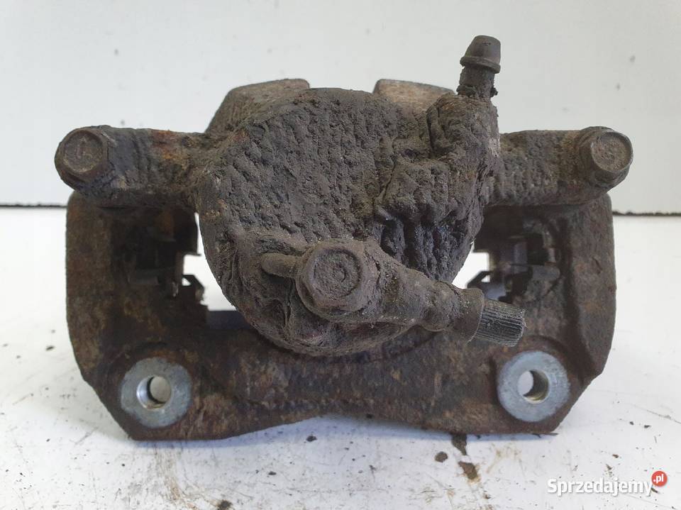 Toyota RAV4 IV V PRZEDNI ZACISK HAMULCOWY lewy Rudka sprzedam