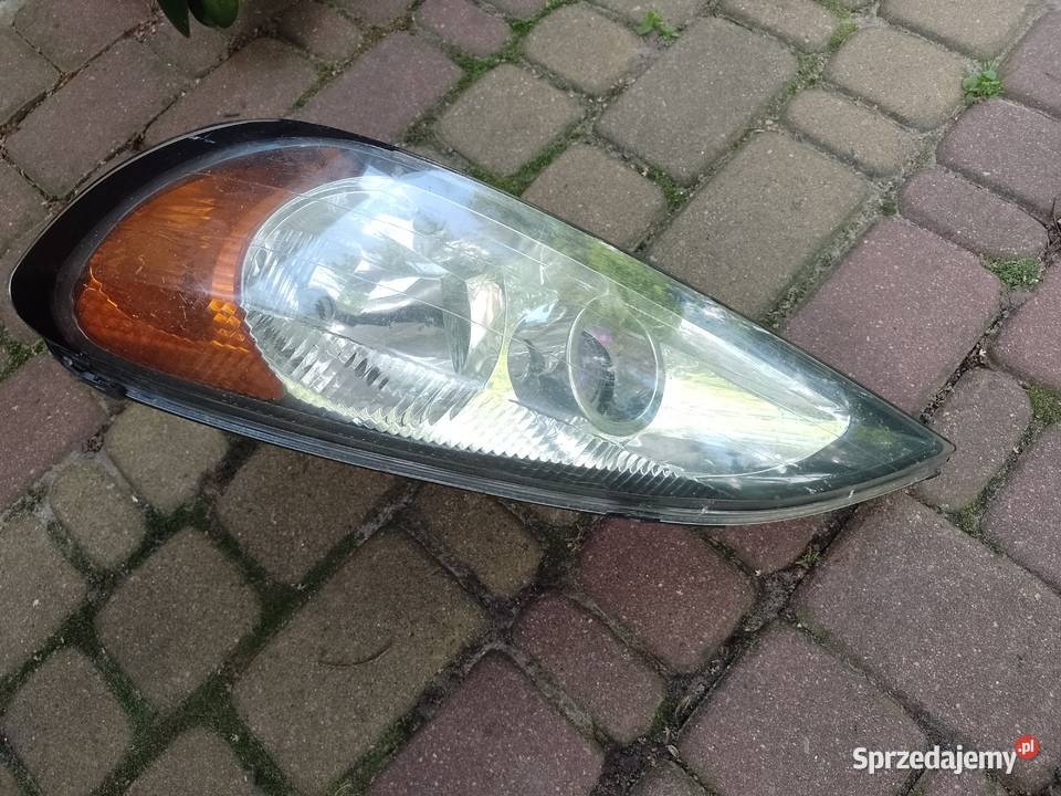 lampa lewa Nissan Primera P 11 lift 9902 uchwyty