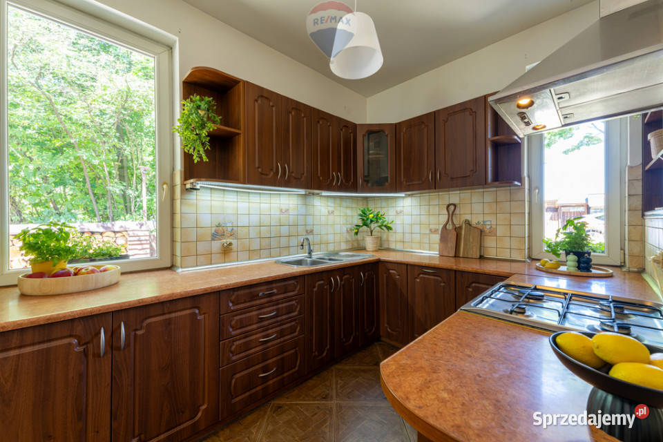 Dom z furtką do lasu na każdy etap życia garaż Łoś