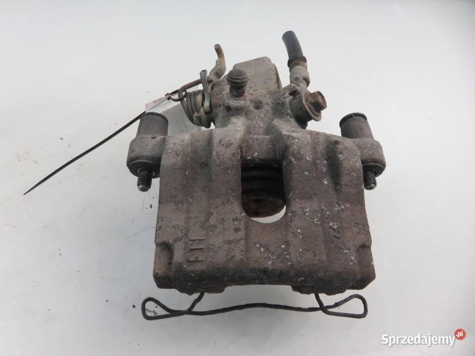 ZACISK LEWY TYŁ NISSAN PRIMERA P12 osobowe Zaciski i jarzma