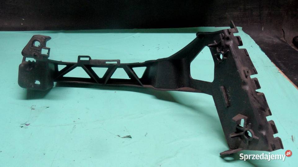 PEUGEOT 207 10r ślizg mocowania zderzaka lewy