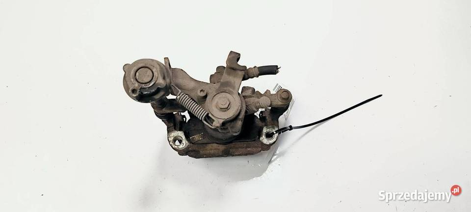 ZACISK HAMULCOWY TYŁ LEWY OPEL ASTRA J osobowe