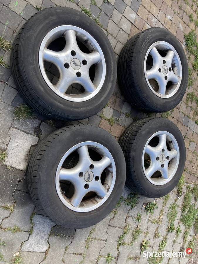 Forda Felgi Aluminiowe Oponami rozmiar 185x65x14 Średnica 14" Samochodowe Chorzów