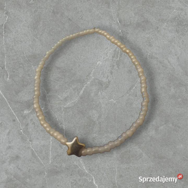 Bransoletka w kolorze białym na elastycznej