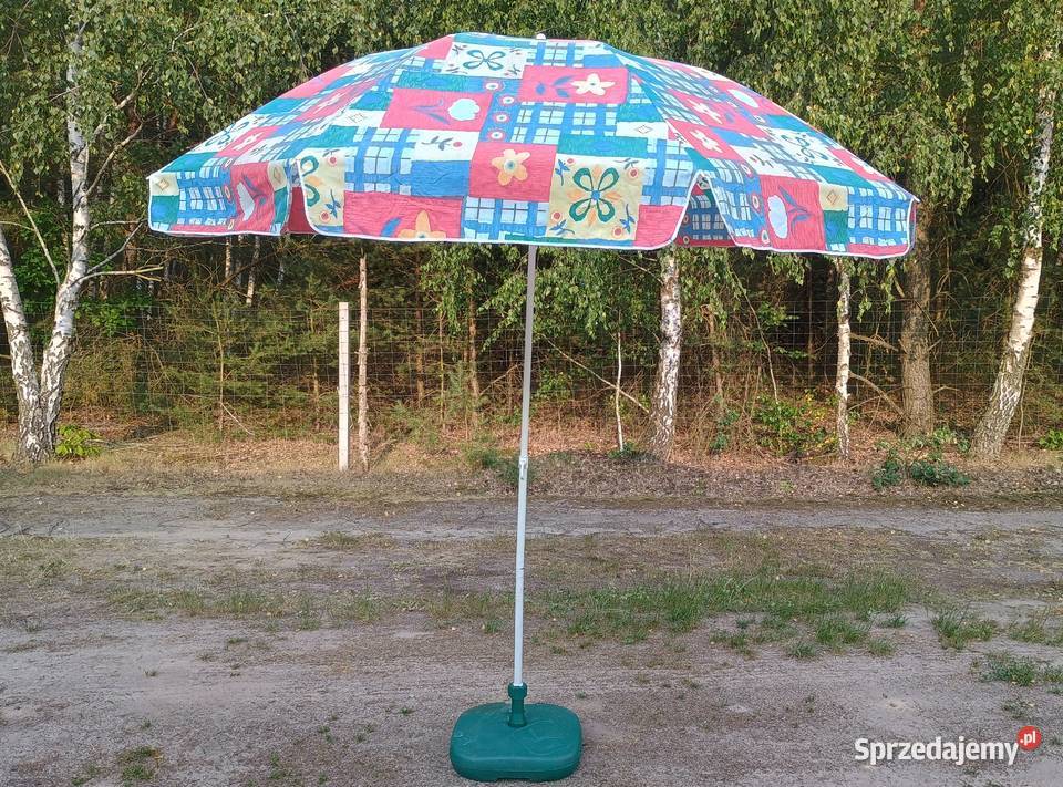 Dużyskładany parasol ogrodowy plus podstawka z Dom i Ogród sprzedam