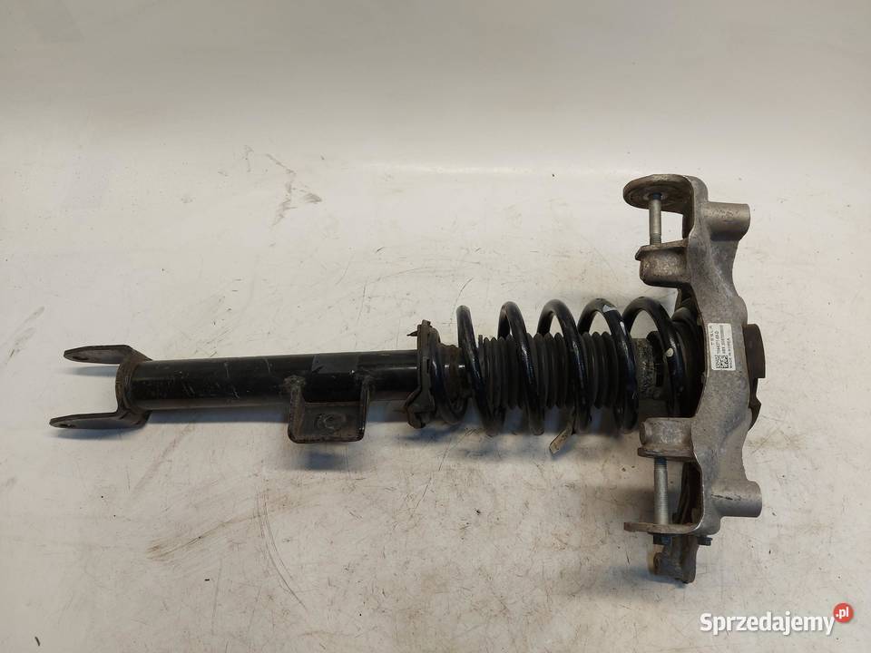 TESLA MODEL 3 Amortyzator przód lewy 104437100D