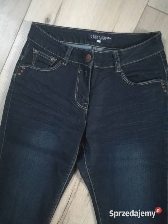 Damskie spodnie z ciemnego denimu w idealnym Dębica